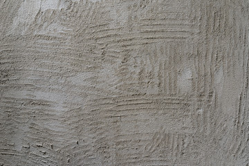 background and texture of rough cement masonry wall