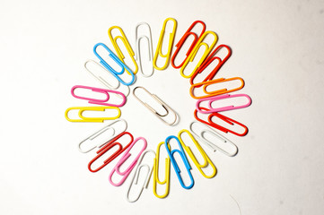 colorful paper clips isolated on white background