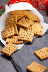 Homemade baked parmesan cheesse crackers with rosemary
