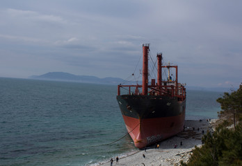 ship in the sea at sunset