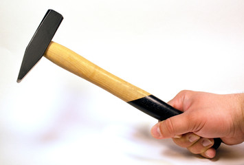 hammer in hand isolated on white background, tool