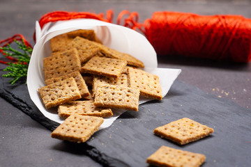 Homemade baked parmesan cheesse crackers with rosemary