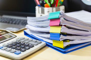 file folder and Stack of business report paper file on the table in a work office, concept document in work office