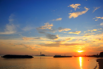Obraz na płótnie Canvas Sunset on the beach,Sea in the morning.From PMY beach,Rayong, Thailand.