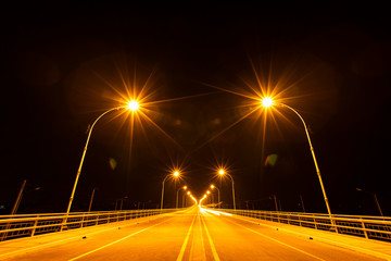 Fototapeta na wymiar the second friendship bridge crossing Moei (Thaungyin) river at nightg, Mae Sot, Tak, Thailand