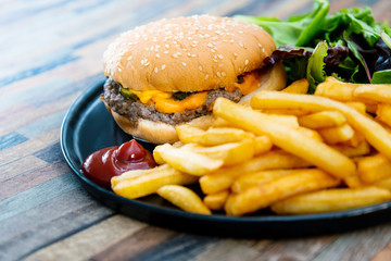 Cheese burger - American cheese burger with Golden French fries