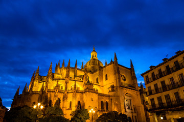 Segovia, Spain – Segovia cathedral in a summer night seen from plaza Mayor. It was the last gothic style cathedral built in Spain, during the sixteenth century.