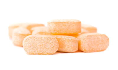 Heap of Vitamin C tablets