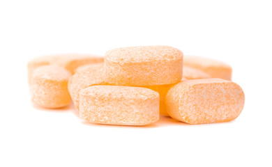 Heap of Vitamin C tablets