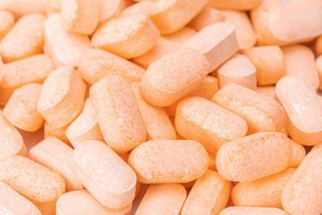 Fototapeta na wymiar Heap of Vitamin C tablets