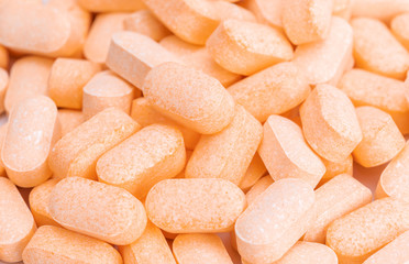 Fototapeta na wymiar Heap of Vitamin C tablets