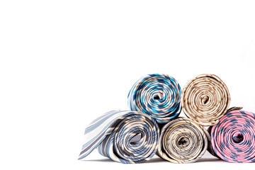Fototapeta na wymiar Multicolored ties on a white background, copy space.