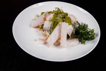 Lard. Strips of fat with copy space. Pork fat slices on a wooden plate, copy space