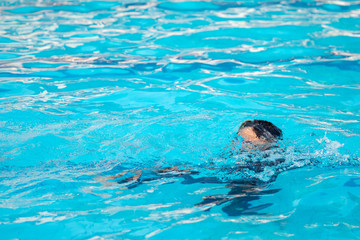 Boy playing water