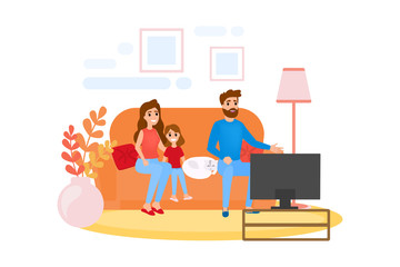 Family sitting at home on couch together