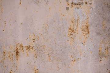 Iron wall with dark brown rust. Corroded metal. Background for design 