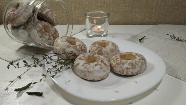 Gingerbreads honey cakes on table and candle