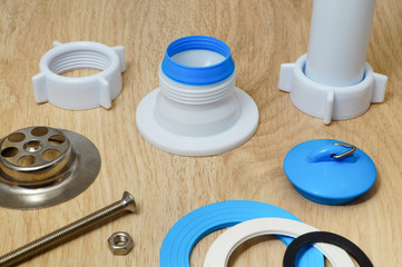 Concept of plumbing works top view on wooden background.