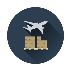 Fototapeta premium Boxes on pallet under airplane
