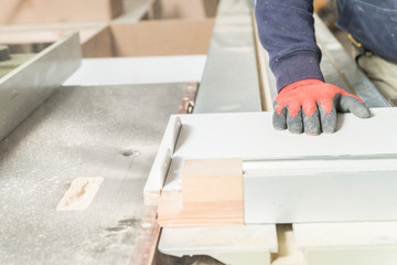 Male carpenter working in his carpentry workshop.