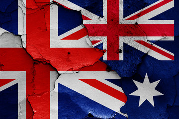 Fototapeta premium flags of UK and Australia painted on cracked wall