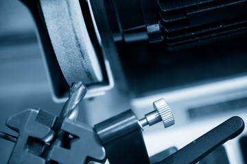 The drill tool regrinding with the grinding machine. The  cutting tool regrinding process .