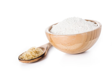 White rice flour in a bowl isolated on white background