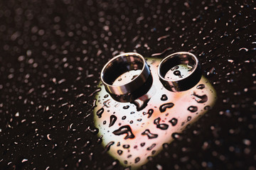 Wedding rings on the rain
