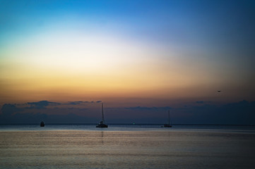 Background sky sunset,love travel to the beach orange tone,Bright in Phuket Thailand,Blue light moment.