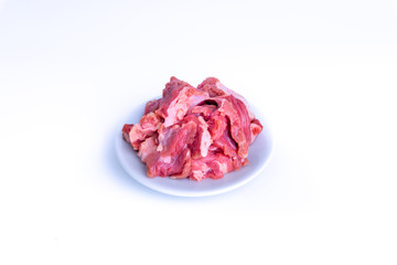 Obraz premium Fresh raw beef steak isolated on white background with selective focus