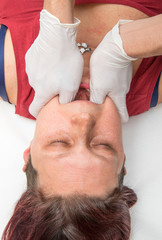 Fototapeta premium woman is doing a osteopathy session