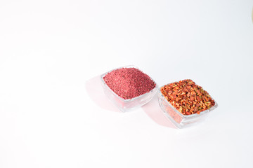 Different spices on the white background