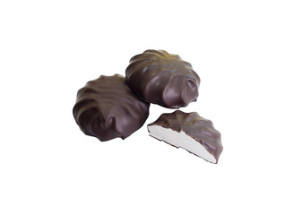 Chocolate candies on white background.