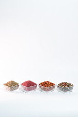 Different spices on the white background