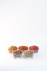 Different spices on the white background
