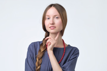 russian girl with braid hair, smiling with confident and friendly look