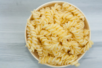 Fusilli pasta in a bowl.