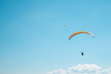 mountains leisure activities. paragliding. summer time