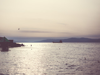 Naklejka premium sunset on beach