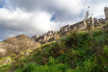 Fototapeta premium Dalyan, Mugla / Turkey - Famous king tombs of Kaunos. Turkey. There are dozens of tombs carved into the rocks around Dalyan and its surroundings.