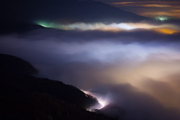 fog over mountain road