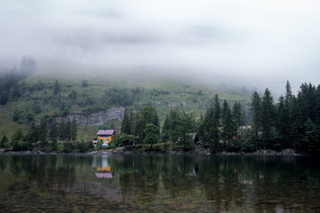 Fototapeta premium Haus am See mit Spiegelung. Appenzell, Schweiz.