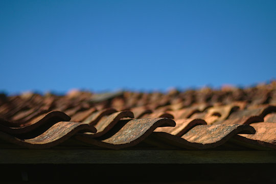 selective focus photography of brown roof