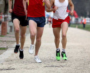 Fototapeta premium runners at finish line after the footrace