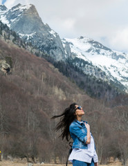 Beautiful Young  Woman with Sunglasses Outdoor Travelling in the Mountain 