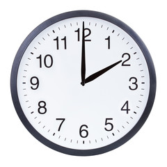 Round office clock showing two o'clock isolated on white background