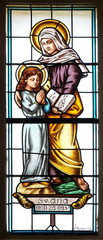 Saint Anne staiined glass window in parish church of the Holy Trinity in Krasic, Croatia