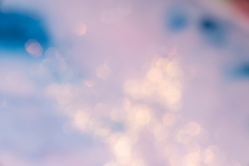 blurred background with colorful blue pink rose gold colors. blur wallpaper with light dots - Bilder