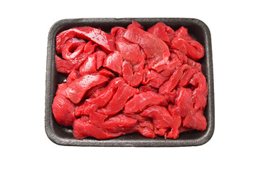 Raw veal slices in container isolated on white background.