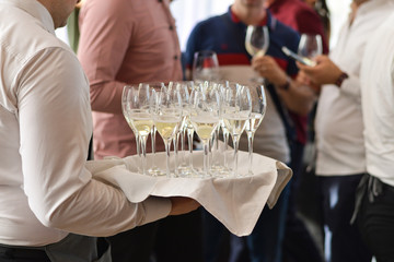 group of people toasting with champagne